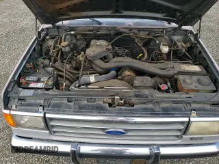 ✅ 1990 Ford F-150 • VIN: 1FTDF15N6LPB40379 • Lot: 86191104. Wystawiony na Copart z przebiegiem 70 952 mil. Bezpłatny archiwum sprzedaży aukcyjnych z USA i szczegółowy raport historii pojazdu na DreamBid. Zdjęcie 15.