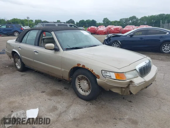 ✅ 1999 Mercury Grand Marquis LS • VIN: 2MEFM75W6XX630636 • Lot: 42471128. Wystawiony na IAAI z przebiegiem 216 223 mil. Bezpłatny archiwum sprzedaży aukcyjnych z USA i szczegółowy raport historii pojazdu na DreamBid. Zdjęcie 1.