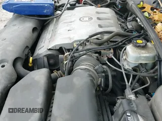 ✅ 2003 Cadillac DeVille • VIN: 1G6KD54Y83U285198 • Lot: 43698428. Listed on IAAI with 123,985 mi. Free auction sales archive from the USA and detailed vehicle history report at DreamBid. Image 19.