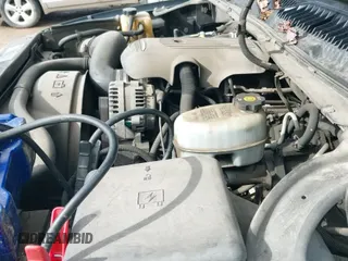 ✅ 2004 Chevrolet Suburban LT • VIN: 3GNEC16T84G317408 • Лот: 41758444. Опубликован ранее на IAAI с пробегом 296 784 миль. Бесплатный доступ к архиву аукционных продаж из США и подробный отчёт об истории автомобиля на DreamBid. Изображение 13.