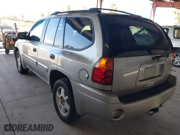 ✅ 2003 GMC Envoy SLE • VIN: 1GKDT13S232143797 • Lot: 42770403. Wystawiony na IAAI z przebiegiem 318 028 mil. Bezpłatny archiwum sprzedaży aukcyjnych z USA i szczegółowy raport historii pojazdu na DreamBid. Zdjęcie 3.