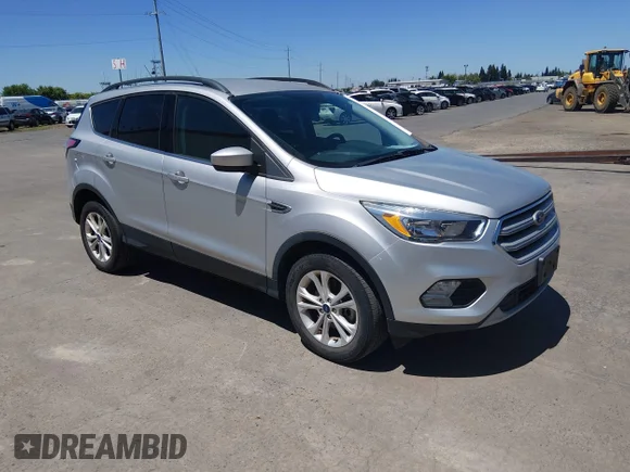 ✅ 2018 Ford Escape SE • VIN: 1FMCU9GD7JUC38769 • Lot: 45159119. Listed on IAAI with 44,512 mi. Free auction sales archive from the USA and detailed vehicle history report at DreamBid. Image 1.