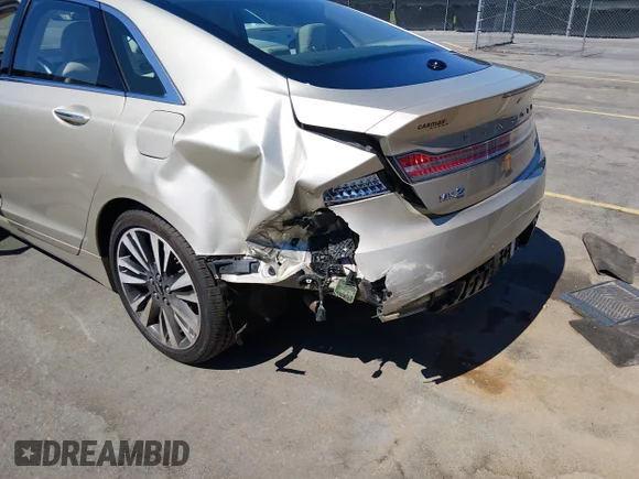 ✅ 2017 Lincoln MKZ Select • VIN: 3LN6L5C91HR614698 • Lot: 45309260. Wystawiony na IAAI z przebiegiem 82 023 mil. Bezpłatny archiwum sprzedaży aukcyjnych z USA i szczegółowy raport historii pojazdu na DreamBid. Zdjęcie 6.