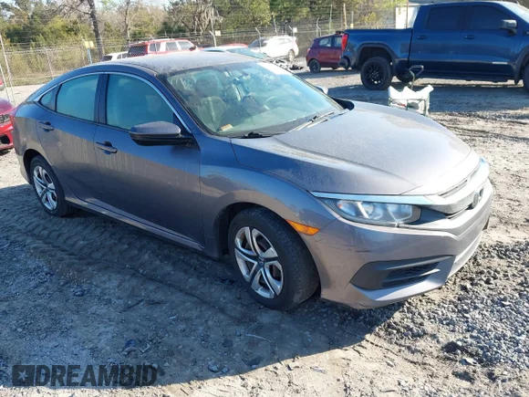 ✅ 2018 Honda Civic LX • VIN: 19XFC2E50JE019352 • Lot: 44669729. Listed on IAAI with 102,286 mi. Free auction sales archive from the USA and detailed vehicle history report at DreamBid. Image 1.