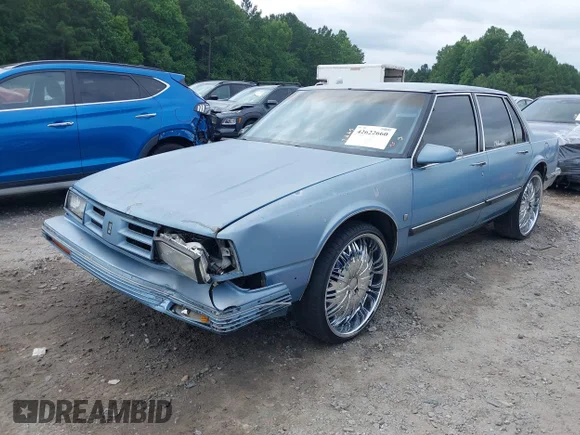 ✅ 1989 Oldsmobile Delta • VIN: 1G3HN54C1KW367706 • Lot: 42622660. Wystawiony na IAAI z przebiegiem 134 738 mil. Bezpłatny archiwum sprzedaży aukcyjnych z USA i szczegółowy raport historii pojazdu na DreamBid. Zdjęcie 2.