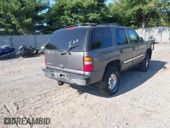 ✅ 2002 GMC Yukon SLT • VIN: 1GKEK13Z42J299221 • Lot: 40302959. Wystawiony na IAAI z przebiegiem 260 096 mil. Bezpłatny archiwum sprzedaży aukcyjnych z USA i szczegółowy raport historii pojazdu na DreamBid. Zdjęcie 4.