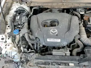 ✅ 2019 Mazda CX-5 Grand Touring Reserve • VIN: JM3KFBDY5K0631405 • Лот: 81048475. Опубликован ранее на Copart с пробегом 133 167 миль. Бесплатный доступ к архиву аукционных продаж из США и подробный отчёт об истории автомобиля на DreamBid. Изображение 15.