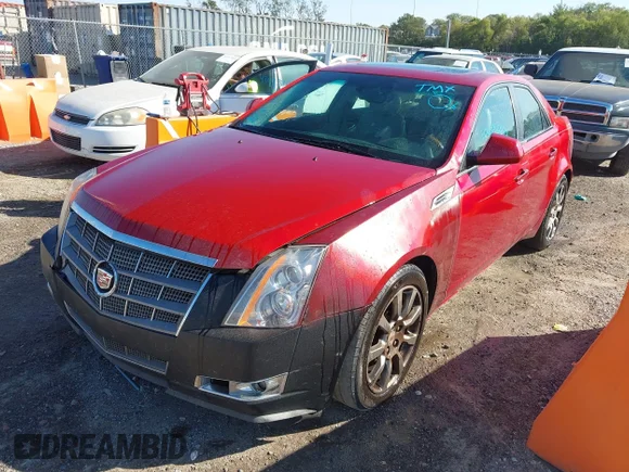 ✅ 2009 Cadillac CTS RWD • VIN: 1G6DJ577990121432 • Лот: 43495845. Опубликован ранее на IAAI с пробегом 228 898 миль. Бесплатный доступ к архиву аукционных продаж из США и подробный отчёт об истории автомобиля на DreamBid. Изображение 2.