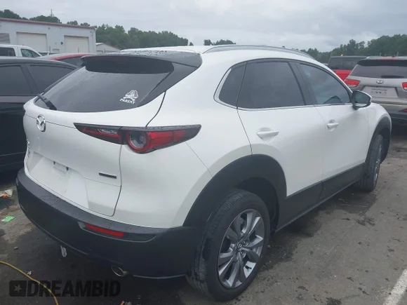 ✅ 2022 Mazda CX-30 S Premium • VIN: 3MVDMBDL8NM447684 • Лот: 43062073. Опубліковано раніше на IAAI з пробігом 39 182 миль. Безкоштовний доступ до архіву аукціонних продажів зі США та докладний звіт про історію автомобіля на DreamBid. Зображення 4.