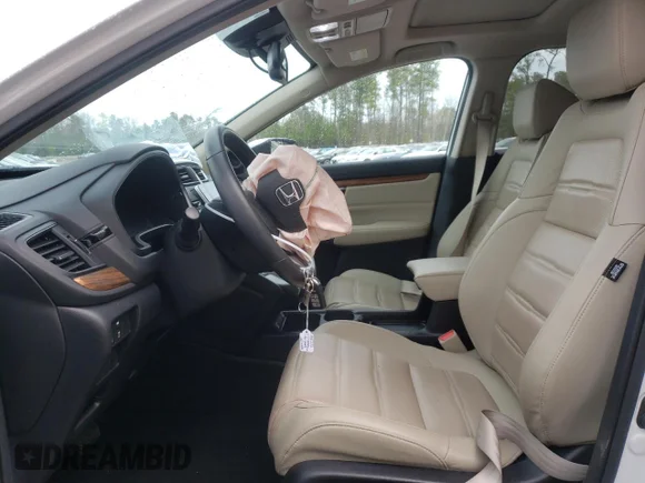✅ 2021 Honda CR-V EX-L • VIN: 2HKRW2H89MH647243 • Lot: 42799483. Listed on Copart with 28,747 mi. Free auction sales archive from the USA and detailed vehicle history report at DreamBid. Image 7.