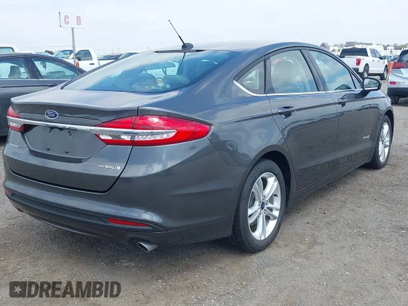 ✅ 2018 Ford Fusion S • VIN: 3FA6P0UU9JR261623 • Лот: 45116057. Опубликован ранее на IAAI с пробегом 14 989 миль. Бесплатный доступ к архиву аукционных продаж из США и подробный отчёт об истории автомобиля на DreamBid. Изображение 4.