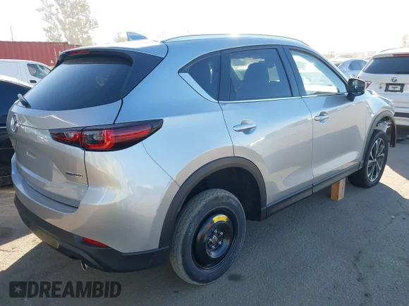 ✅ 2023 Mazda CX-5 S Premium • VIN: JM3KFBDM9P0278283 • Lot: 43926469. Wystawiony na IAAI z przebiegiem 24 360 mil. Bezpłatny archiwum sprzedaży aukcyjnych z USA i szczegółowy raport historii pojazdu na DreamBid. Zdjęcie 4.