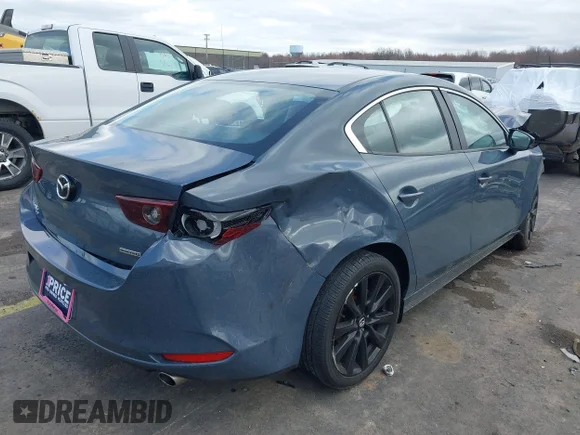 ✅ 2025 Mazda 3 S Carbon Edition • VIN: 3MZBPBCM2SM465942 • Lot: 44616006. Listed on IAAI with 21,700 mi. Free auction sales archive from the USA and detailed vehicle history report at DreamBid. Image 4.