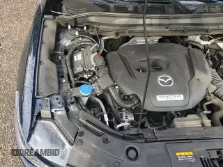 ✅ 2024 Mazda CX-5 Premium • VIN: JM3KFBDY2R0506243 • Lot: 68122115. Wystawiony na Copart z przebiegiem 32 840 mil. Bezpłatny archiwum sprzedaży aukcyjnych z USA i szczegółowy raport historii pojazdu na DreamBid. Zdjęcie 14.