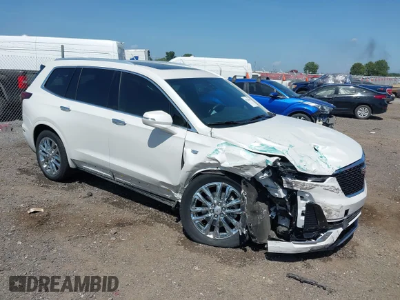 ✅ 2022 Cadillac XT6 Luxury • VIN: 1GYKPAR43NZ106343 • Lot: 42786460. Wystawiony na IAAI z przebiegiem 25 497 mil. Bezpłatny archiwum sprzedaży aukcyjnych z USA i szczegółowy raport historii pojazdu na DreamBid. Zdjęcie 1.