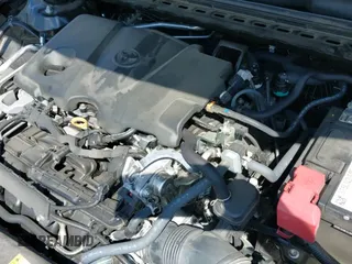 2022 Toyota Camry SE with VIN 4T1G11BK1NU050000, listed as a IAAI auction lot 42348766 with 57,429 mi miles and . Bid and sale history available at DreamBid. Image 19.