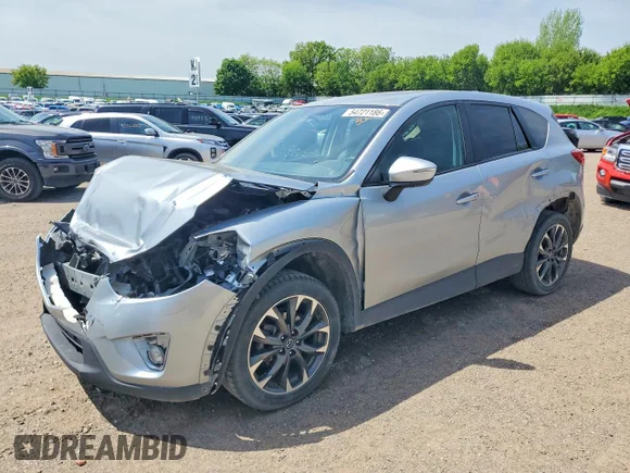 ✅ 2016 Mazda CX-5 Grand Touring • VIN: JM3KE4DY7G0664878 • Lot: 54721186. Wystawiony na Copart z przebiegiem Nie podano. Bezpłatny archiwum sprzedaży aukcyjnych z USA i szczegółowy raport historii pojazdu na DreamBid. Zdjęcie 1.