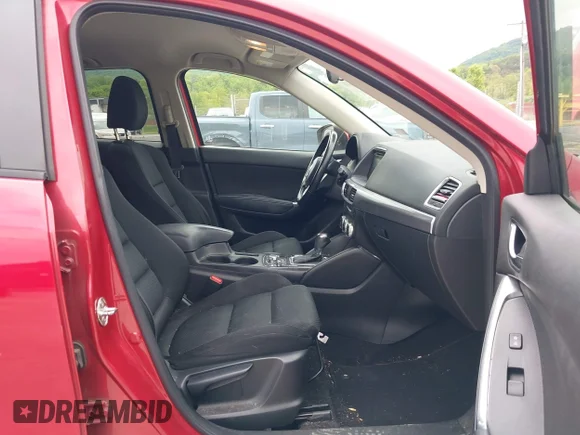 ✅ 2016 Mazda CX-5 Touring • VIN: JM3KE4CY4G0860567 • Lot: 45173410. Wystawiony na IAAI z przebiegiem 185 004 mil. Bezpłatny archiwum sprzedaży aukcyjnych z USA i szczegółowy raport historii pojazdu na DreamBid. Zdjęcie 5.