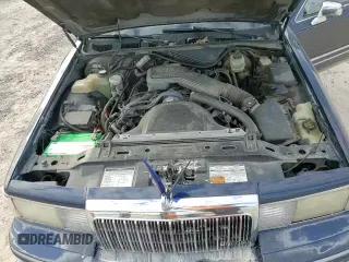 ✅ 1993 Lincoln Town Car Signature • VIN: 1LNLM82W9PY675340 • Лот: 84941594. Опубликован ранее на Copart с пробегом 199 661 миль. Бесплатный доступ к архиву аукционных продаж из США и подробный отчёт об истории автомобиля на DreamBid. Изображение 16.