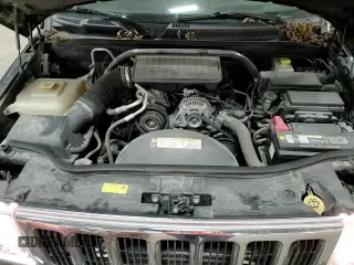 ✅ 2008 Jeep Commander Sport • VIN: 1J8HG48K18C153999 • Lot: 82716394. Wystawiony na Copart z przebiegiem 164 907 mil. Bezpłatny archiwum sprzedaży aukcyjnych z USA i szczegółowy raport historii pojazdu na DreamBid. Zdjęcie 14.