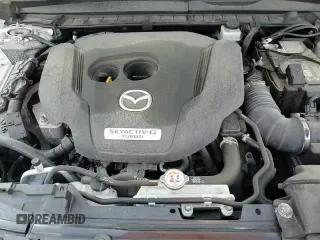 ✅ 2023 Mazda CX-50 Premium • VIN: 7MMVABDY0PN116603 • Лот: 59129185. Опубликован ранее на Copart с пробегом 58 985 миль. Бесплатный доступ к архиву аукционных продаж из США и подробный отчёт об истории автомобиля на DreamBid. Изображение 14.