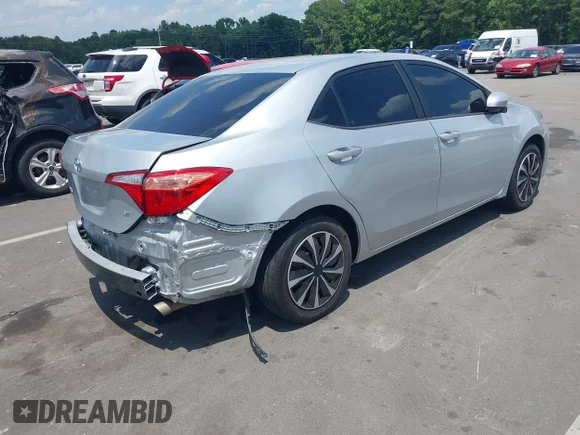 ✅ 2018 Toyota Corolla SE • VIN: 2T1BURHE3JC047922 • Lot: 45435513. Listed on IAAI with 137,520 mi. Free auction sales archive from the USA and detailed vehicle history report at DreamBid. Image 4.