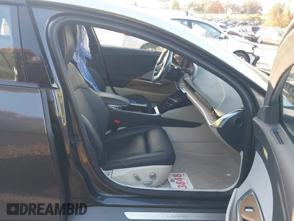 ✅ 2023 Lucid Air Touring • VIN: 50EA1TEA1PA004661 • Lot: 43584748. Listed on IAAI with 30,471 mi. Free auction sales archive from the USA and detailed vehicle history report at DreamBid. Image 5.