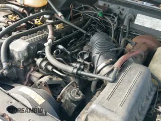 ✅ 1990 Jeep Cherokee • VIN: 1J4FJ38L1LL129725 • Lot: 42697514. Wystawiony na IAAI z przebiegiem 416 387 mil. Bezpłatny archiwum sprzedaży aukcyjnych z USA i szczegółowy raport historii pojazdu na DreamBid. Zdjęcie 12.