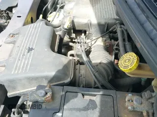 1997 Dodge Caravan Sport z VIN 2B4GP4436VR411449, wystawiony jako IAAI lot #42465067 z przebiegiem Nie podano mil oraz . Historia ofert i sprzedaży dostępna na DreamBid. Obrazek 19.