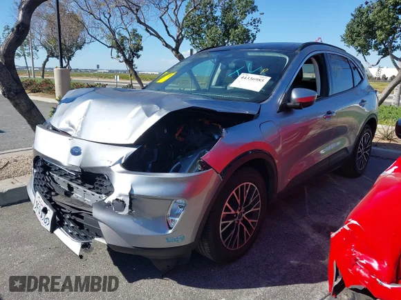 ✅ 2022 Ford Escape SEL Plug-In Hybrid • VIN: 1FMCU0KZ4NUB95027 • Лот: 44336985. Опубліковано раніше на IAAI з пробігом 36 877 миль. Безкоштовний доступ до архіву аукціонних продажів зі США та докладний звіт про історію автомобіля на DreamBid. Зображення 2.