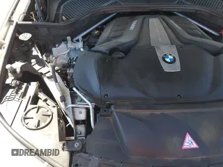 ✅ 2018 BMW X5 xDrive50i • VIN: 5UXKR6C50J0U14128 • Лот: 80467725. Опубликован ранее на Copart с пробегом 90 225 миль. Бесплатный доступ к архиву аукционных продаж из США и подробный отчёт об истории автомобиля на DreamBid. Изображение 16.