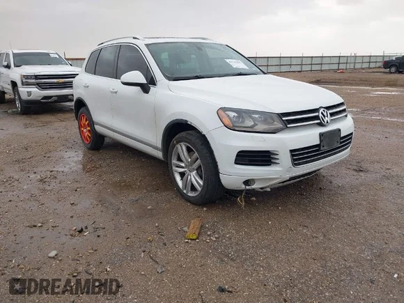 ✅ 2013 Volkswagen Touareg Exec • VIN: WVGEP9BPXDD010707 • Лот: 41706225. Опубликован ранее на IAAI с пробегом 157 421 миль. Бесплатный доступ к архиву аукционных продаж из США и подробный отчёт об истории автомобиля на DreamBid. Изображение 1.