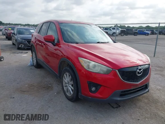 ✅ 2015 Mazda CX-5 Touring • VIN: JM3KE2CY4F0436681 • Lot: 45449327. Wystawiony na IAAI z przebiegiem 248 147 mil. Bezpłatny archiwum sprzedaży aukcyjnych z USA i szczegółowy raport historii pojazdu na DreamBid. Zdjęcie 1.