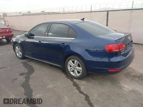 ✅ 2013 Volkswagen Jetta Hybrid • VIN: 3VW637AJ1DM277628 • Lot: 43992120. Wystawiony na IAAI z przebiegiem 124 053 mil. Bezpłatny archiwum sprzedaży aukcyjnych z USA i szczegółowy raport historii pojazdu na DreamBid. Zdjęcie 3.