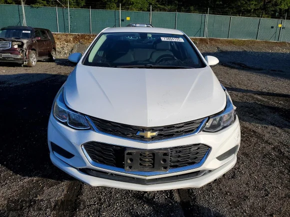 ✅ 2018 Chevrolet Cruze LS • VIN: 1G1BC5SM9J7157394 • Lot: 73804155. Wystawiony na Copart z przebiegiem 45 160 mil. Bezpłatny archiwum sprzedaży aukcyjnych z USA i szczegółowy raport historii pojazdu na DreamBid. Zdjęcie 5.