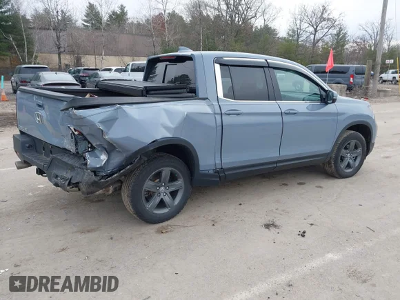 ✅ 2023 Honda Ridgeline RTL • VIN: 5FPYK3F55PB061686 • Lot: 43765156. Listed on IAAI with 16,794 mi. Free auction sales archive from the USA and detailed vehicle history report at DreamBid. Image 4.