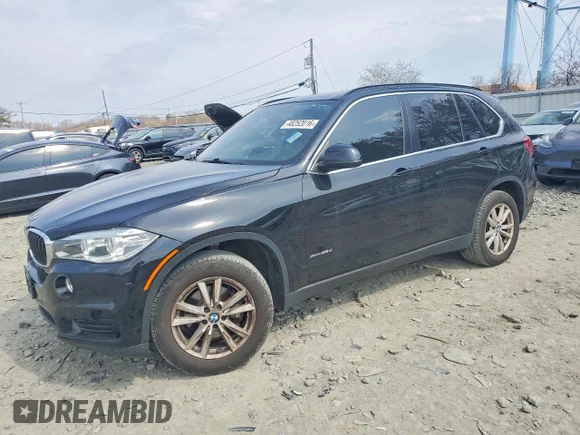 ✅ 2015 BMW X5 xDrive35d • VIN: 5UXKS4C5XF0N06699 • Lot: 48252016. Listed on Copart with 102,380 mi. Free auction sales archive from the USA and detailed vehicle history report at DreamBid. Image 1.