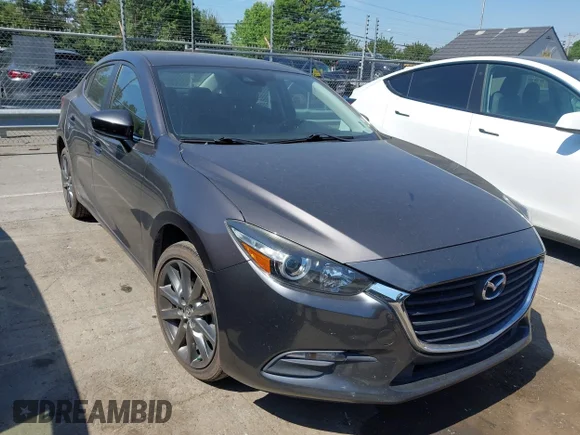 ✅ 2018 Mazda 3 Touring • VIN: 3MZBN1V30JM257416 • Лот: 45132239. Опубликован ранее на IAAI с пробегом 137 557 миль. Бесплатный доступ к архиву аукционных продаж из США и подробный отчёт об истории автомобиля на DreamBid. Изображение 1.