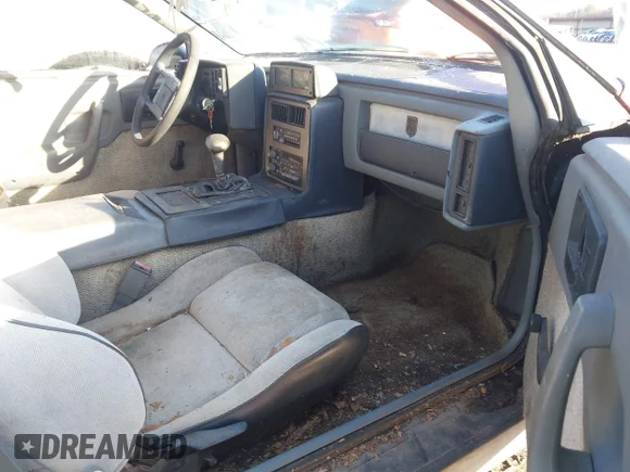 ✅ 1986 Pontiac Fiero • VIN: 1G2PF3790GP222272 • Лот: 44598462. Опубликован ранее на IAAI с пробегом 227 968 миль. Бесплатный доступ к архиву аукционных продаж из США и подробный отчёт об истории автомобиля на DreamBid. Изображение 5.