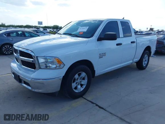 ✅ 2023 Ram 1500 Tradesman • VIN: 1C6RR6FG1PS565061 • Lot: 42786614. Listed on IAAI with 9,867 mi. Free auction sales archive from the USA and detailed vehicle history report at DreamBid. Image 2.