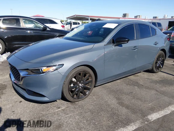 ✅ 2025 Mazda 3 S Carbon Edition • VIN: JM1BPBCM8S1781040 • Lot: 45149278. Listed on IAAI with 16,973 mi. Free auction sales archive from the USA and detailed vehicle history report at DreamBid. Image 17.