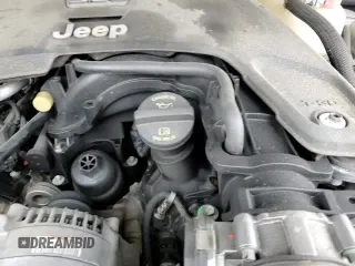 ✅ 2018 Jeep Wrangler Unlimited Moab • VIN: 1C4HJXEG0JW116909 • Лот: 90076355. Опубликован ранее на Copart с пробегом 69 284 миль. Бесплатный доступ к архиву аукционных продаж из США и подробный отчёт об истории автомобиля на DreamBid. Изображение 14.