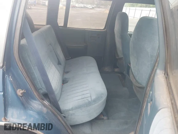 ✅ 1994 Chevrolet Blazer • VIN: 1GNDT13W7R0163053 • Lot: 43374838. Wystawiony na IAAI z przebiegiem 10 000 mil. Bezpłatny archiwum sprzedaży aukcyjnych z USA i szczegółowy raport historii pojazdu na DreamBid. Zdjęcie 8.
