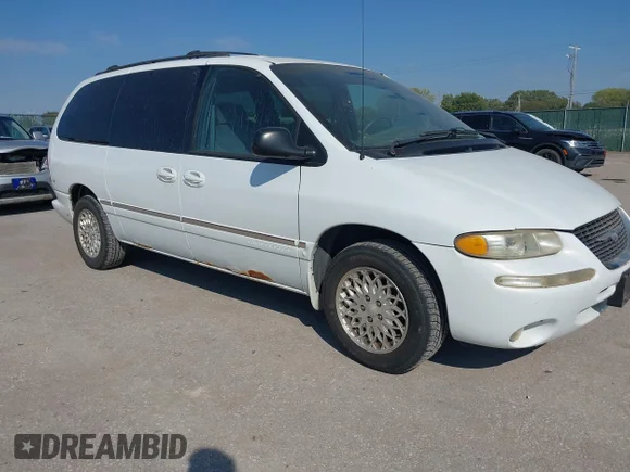 ✅ 1998 Chrysler Town & Country • VIN: 1C4GP54L5WB589684 • Lot: 43404323. Listed on IAAI with 250,802 mi. Free auction sales archive from the USA and detailed vehicle history report at DreamBid. Image 1.