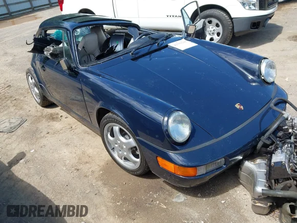 ✅ 1990 Porsche 911 • VIN: WP0AB2963LS450848 • Lot: 42319248. Listed on IAAI with Not provided. Free auction sales archive from the USA and detailed vehicle history report at DreamBid. Image 1.