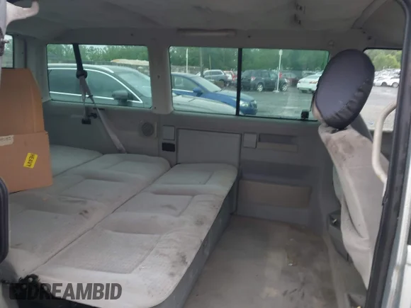 ✅ 2003 Volkswagen EuroVan MV • VIN: WV2MB47073H021704 • Lot: 44973368. Listed on IAAI with 136,791 mi. Free auction sales archive from the USA and detailed vehicle history report at DreamBid. Image 8.