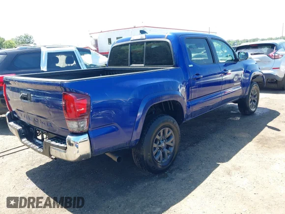 ✅ 2023 Toyota Tacoma SR • VIN: 3TYAX5GN8PT075684 • Lot: 42527013. Wystawiony na IAAI z przebiegiem 51 008 mil. Bezpłatny archiwum sprzedaży aukcyjnych z USA i szczegółowy raport historii pojazdu na DreamBid. Zdjęcie 4.