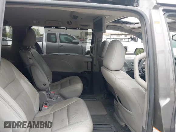 ✅ 2016 Toyota Sienna XLE • VIN: 5TDYK3DC2GS741132 • Lot: 45133362. Listed on IAAI with 115,383 mi. Free auction sales archive from the USA and detailed vehicle history report at DreamBid. Image 8.