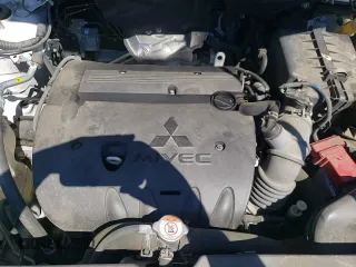 2019 Mitsubishi Outlander ES с VIN JA4AR3AU3KU026126, выставлен на аукционе Copart как лот 69208035 с пробегом 103 638 миль миль и Списание • Salvage title. История ставок и продаж доступна на DreamBid. Изображение 14.