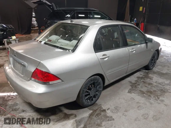 ✅ 2005 Mitsubishi Lancer ES • VIN: JA3AJ26E85U027851 • Lot: 44285557. Wystawiony na IAAI z przebiegiem 141 109 mil. Bezpłatny archiwum sprzedaży aukcyjnych z USA i szczegółowy raport historii pojazdu na DreamBid. Zdjęcie 4.
